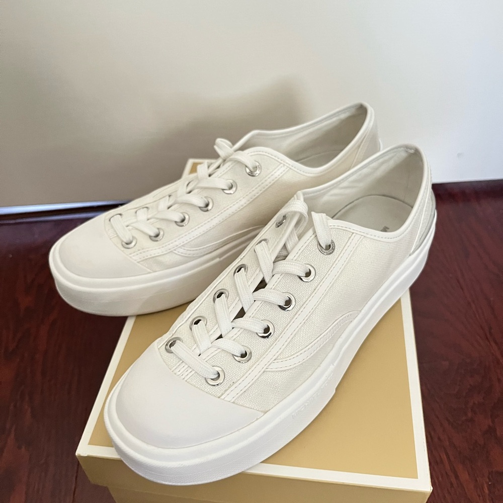 Like new Michael Kors canvas sneakers in cream white